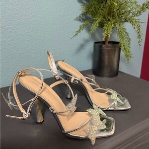 Silver butterfly heels